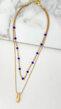 Short gold double layer necklace with blue crystals