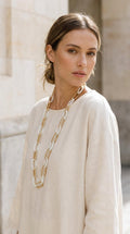 Long gold and white beaded loops necklace