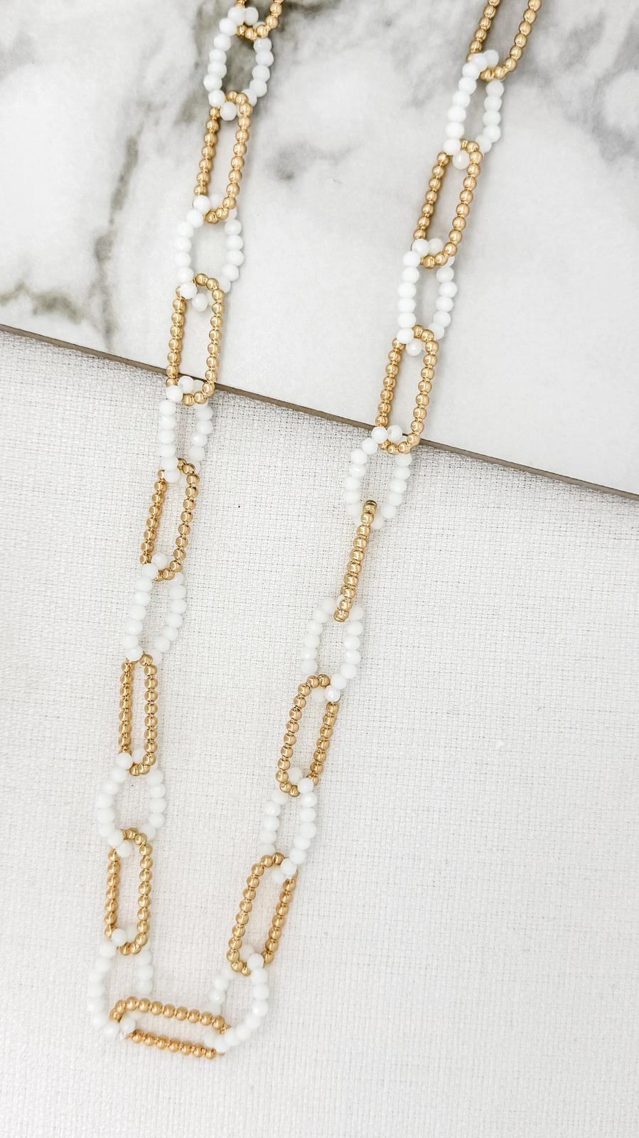 Long gold and white beaded loops necklace