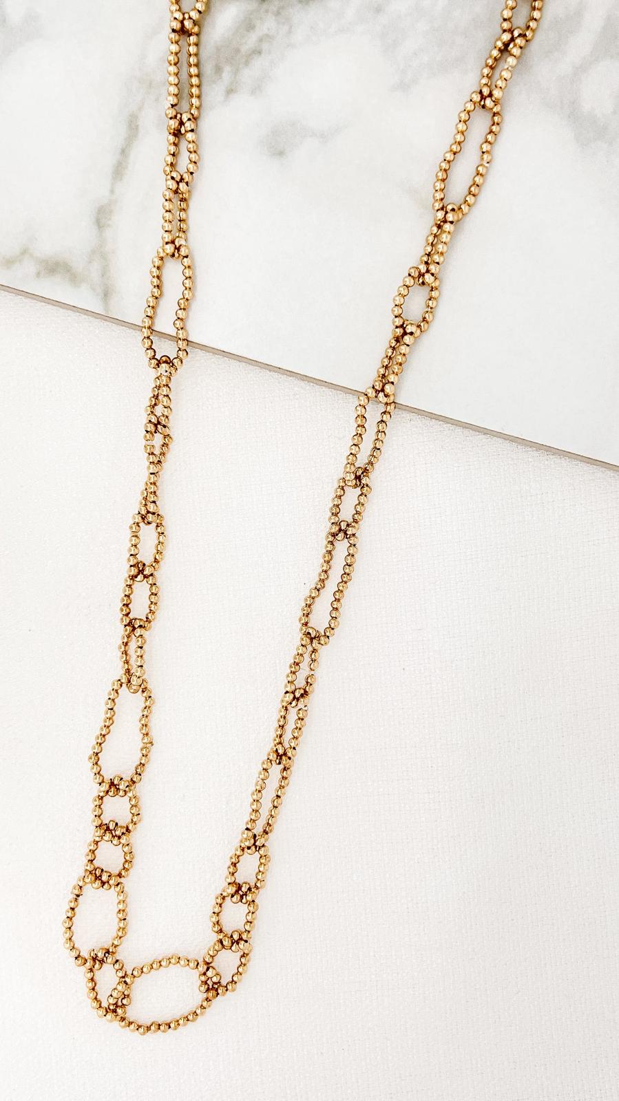 Long gold loop necklace