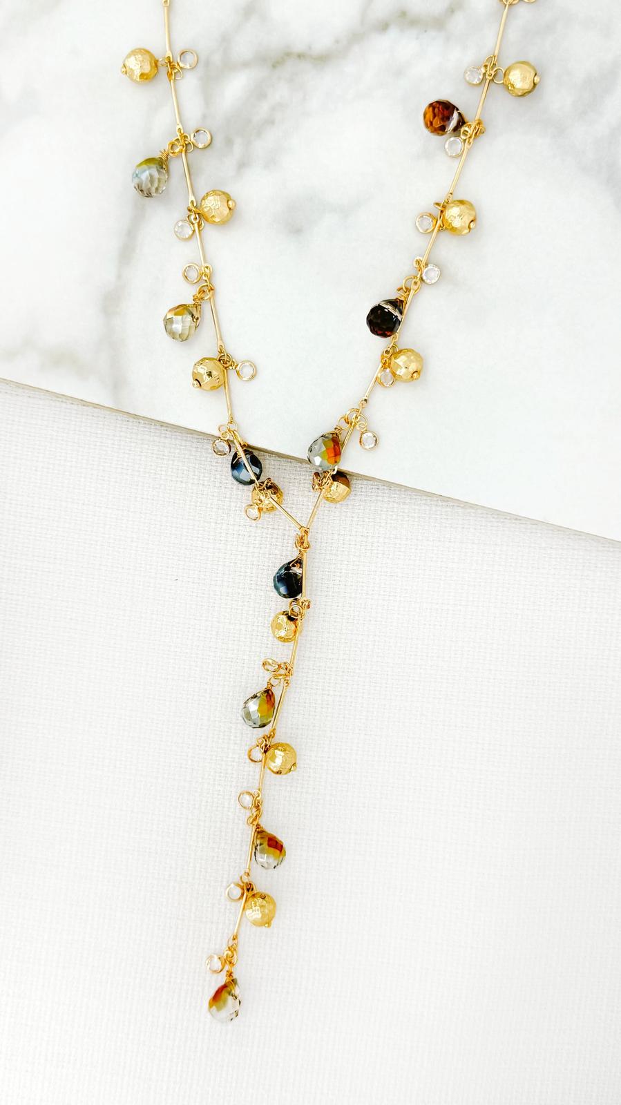 Long gold and faceted crystal bead lariat necklace