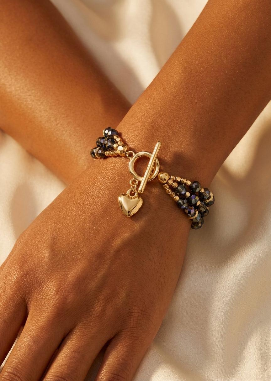 Gold and smoky grey bead layer bracelet with T-bar clasp